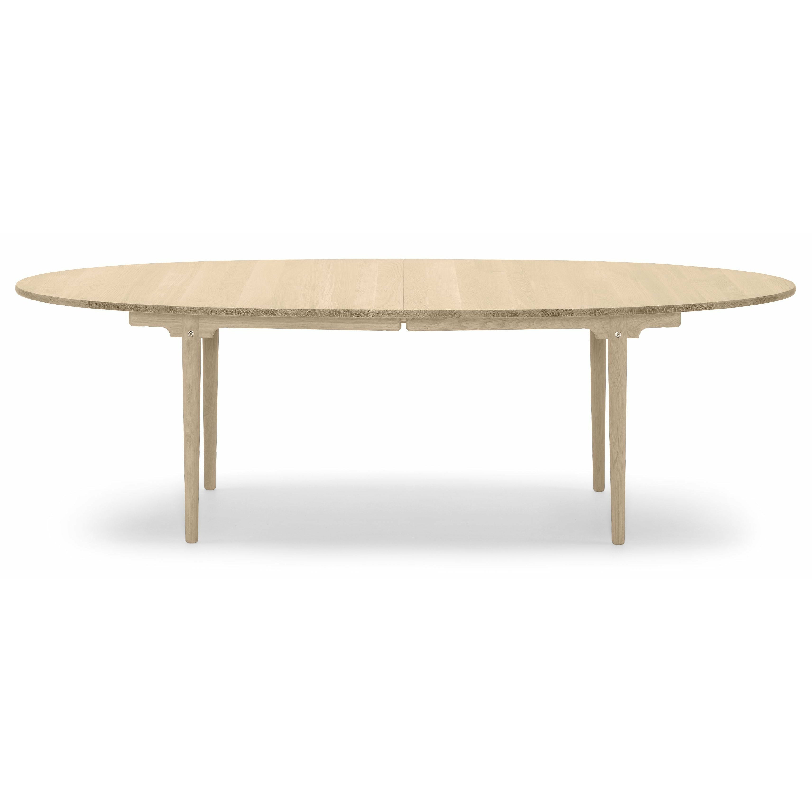 Jídelní stůl Carl Hansen CH339 navržený pro 4 vytahovací talíře, dubový naolejovaný